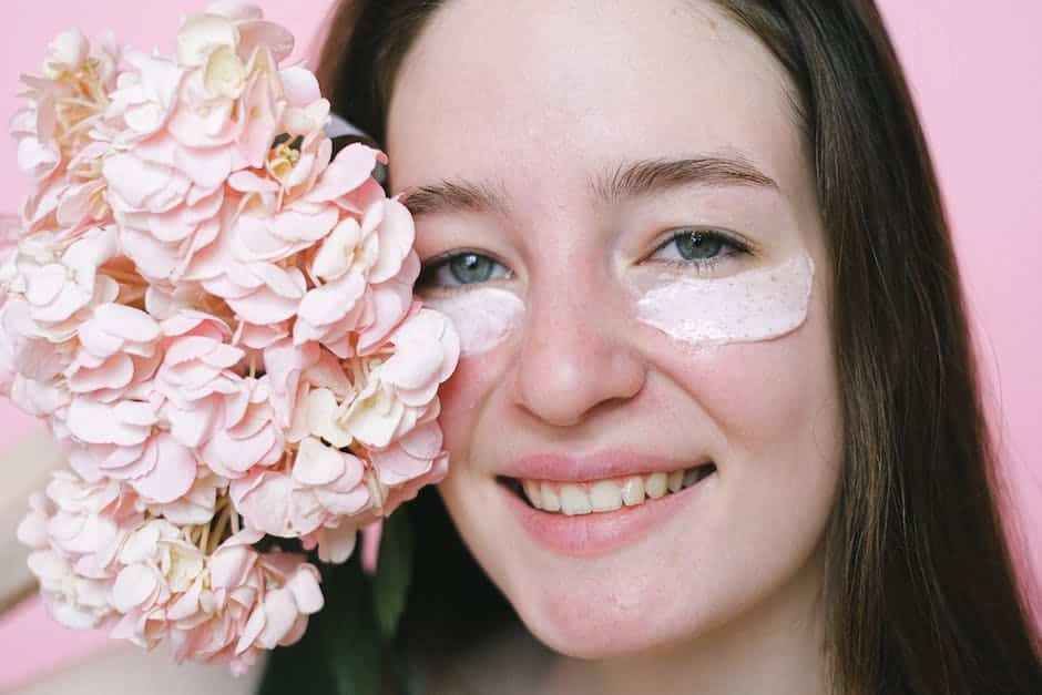 An image of a woman applying anti-aging eye cream