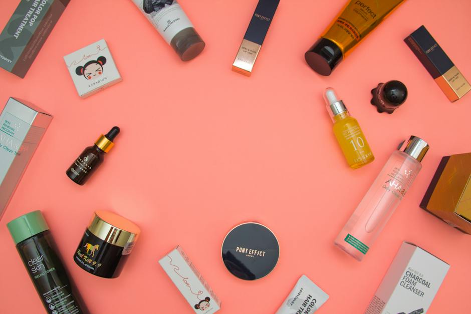 A bottle of toner surrounded by different skincare products